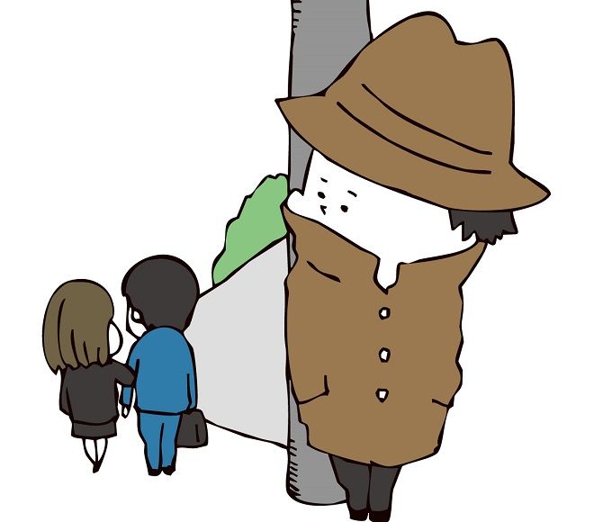 尾行する探偵